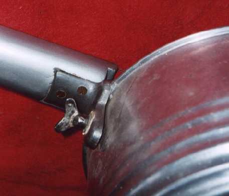 The action adjustment screw on a cumbus